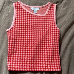 Primary tank top
